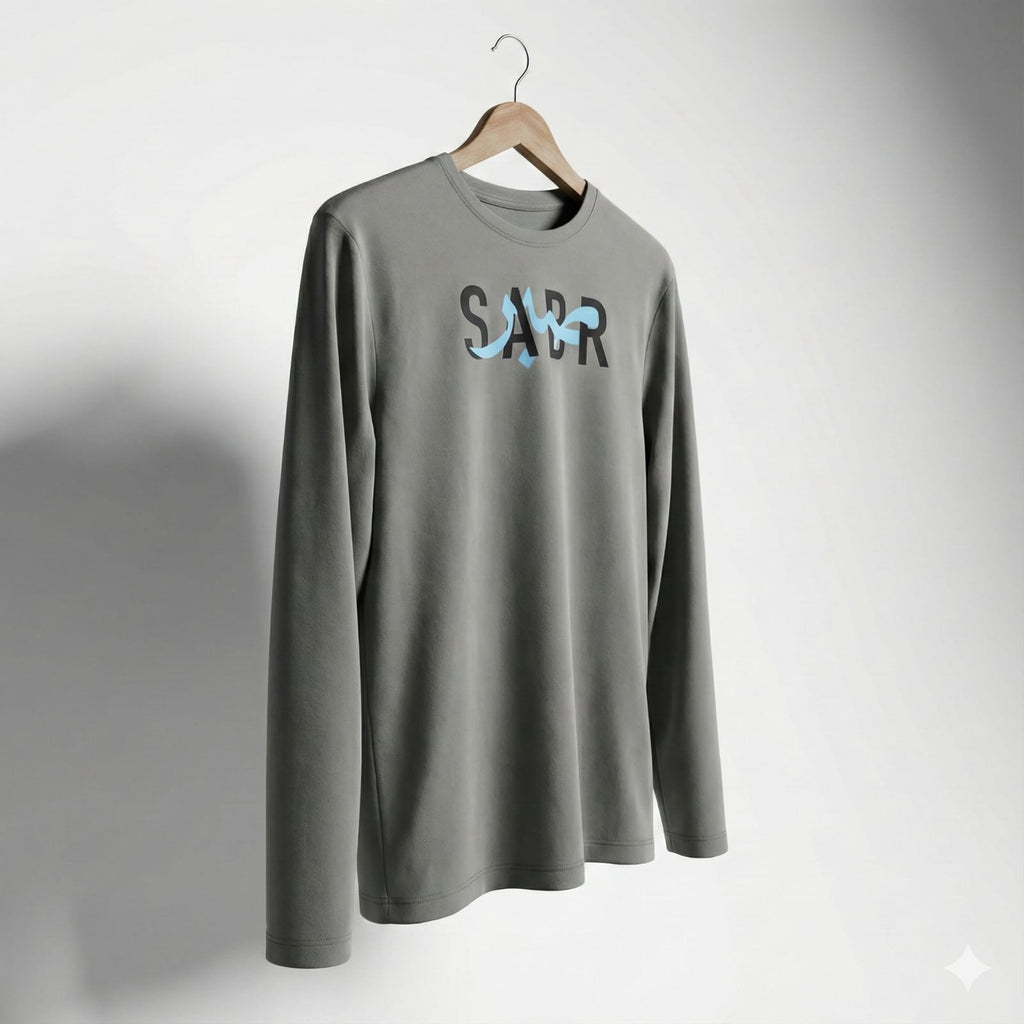 A cool-gray long-sleeve tee finished with a bold SABR graphic for a clean streetwear look.